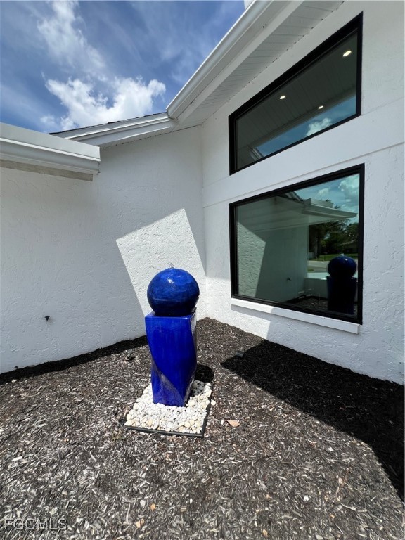 1919 Countess Court Naples, FL 34110 - Photo 29 of 30 a view of a fireplace in a room