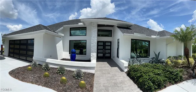 a front view of a house with porch