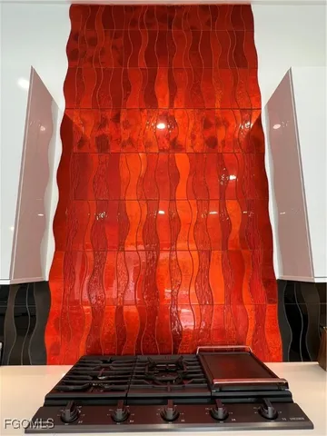 a room with a door and wooden floor