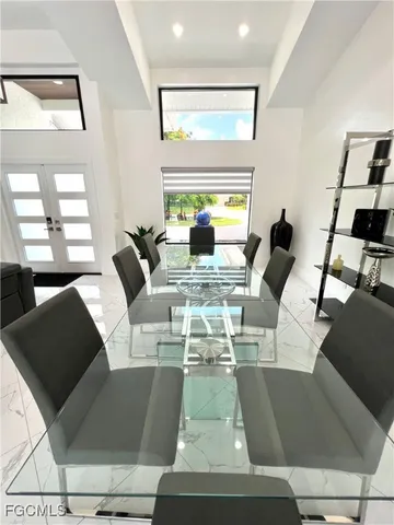 a view of a living room and dining room