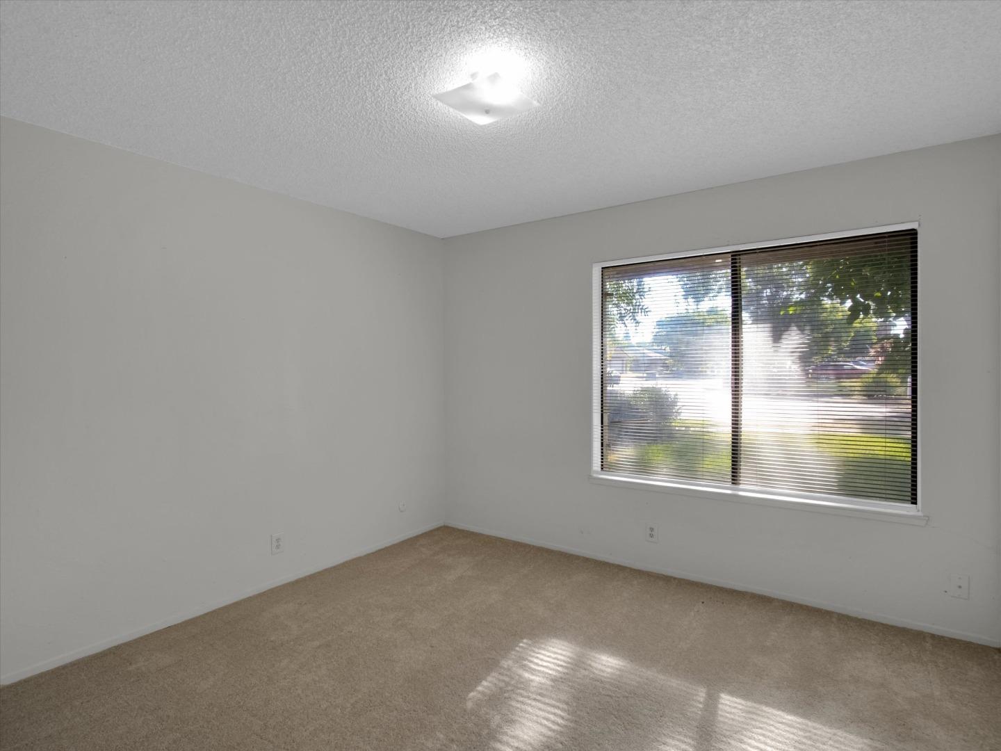 3559 Vernal Avenue Merced, CA 95340 - Photo 15 of 25 an empty room with window