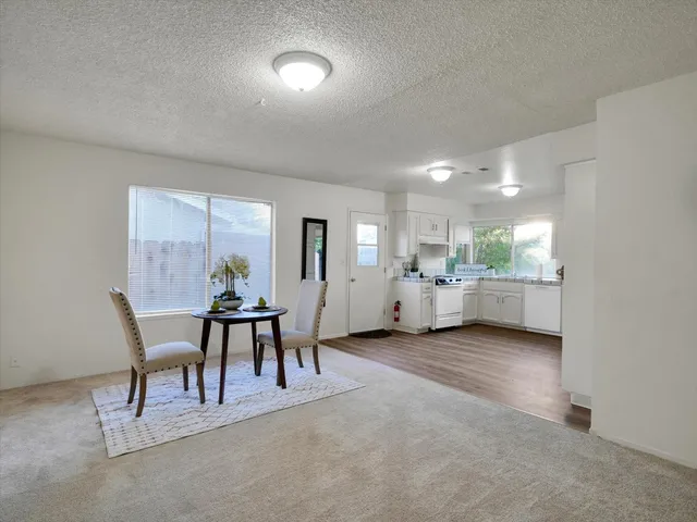 a view of a room with furniture and a livingroom