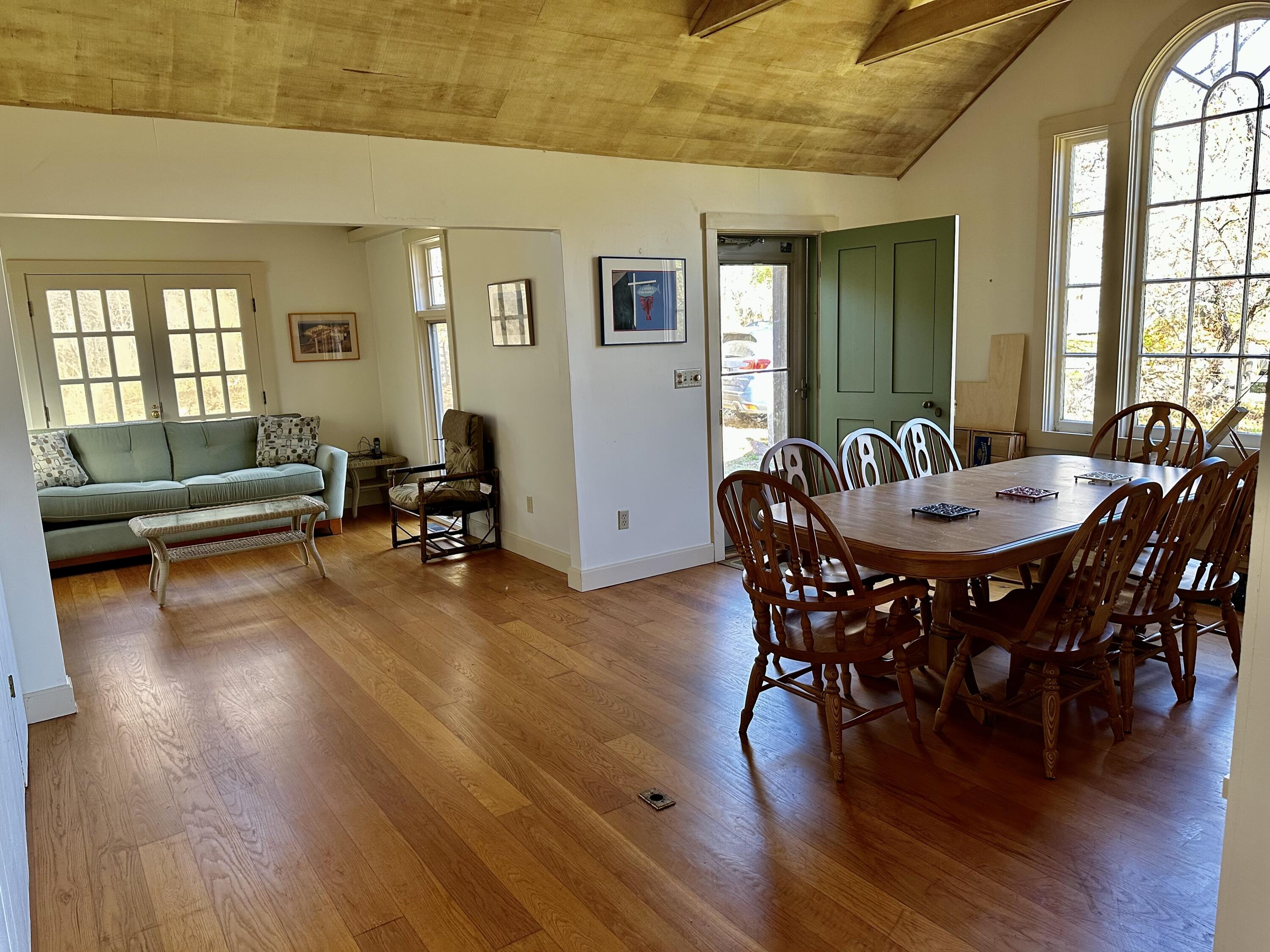 8 Harpoon Hollow Road Aquinnah, MA 02535 - Photo 2 of 29 a view of a dining room with furniture window and wooden floor