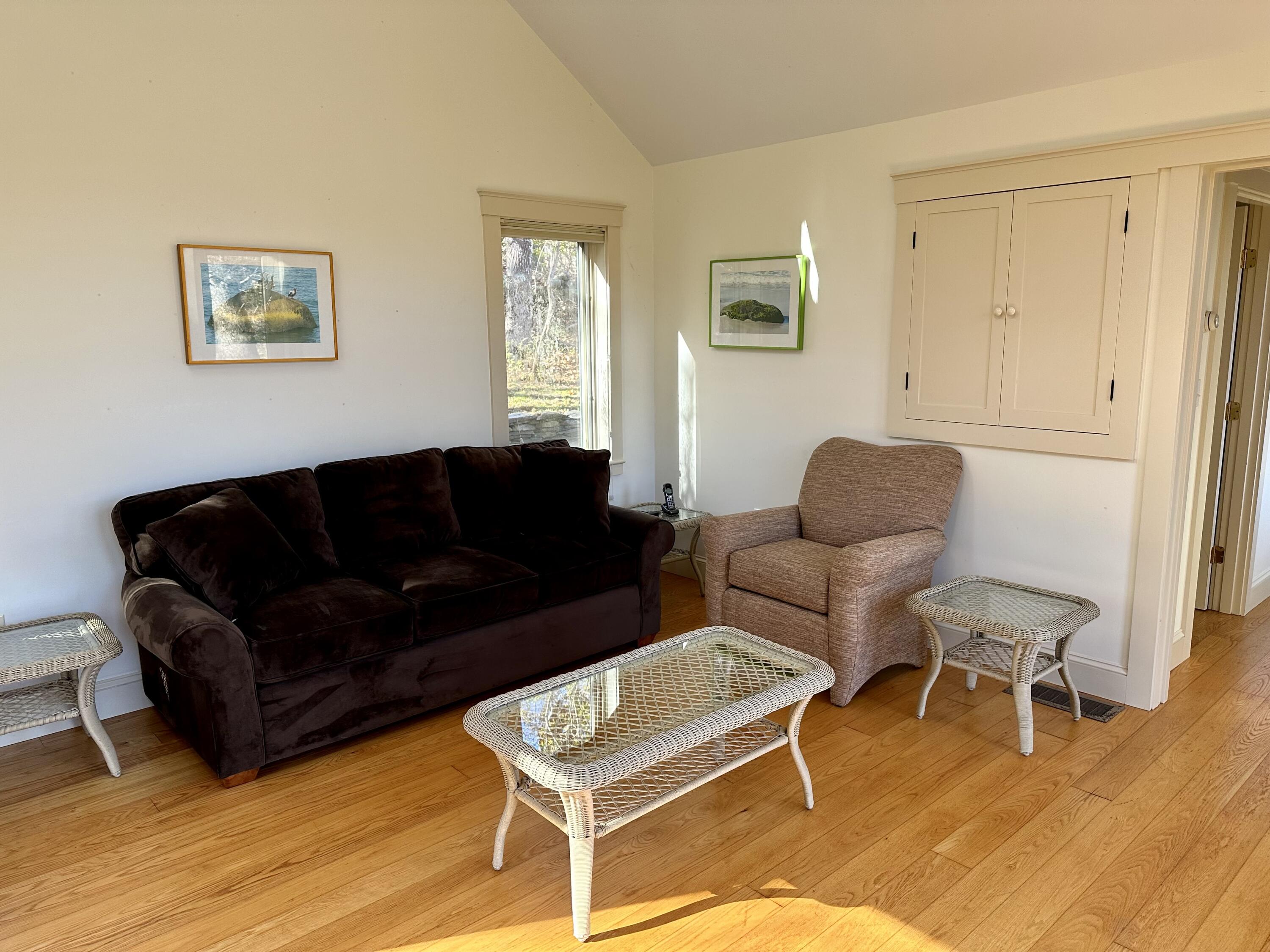 8 Harpoon Hollow Road Aquinnah, MA 02535 - Photo 8 of 29 a living room with furniture and a wooden floor