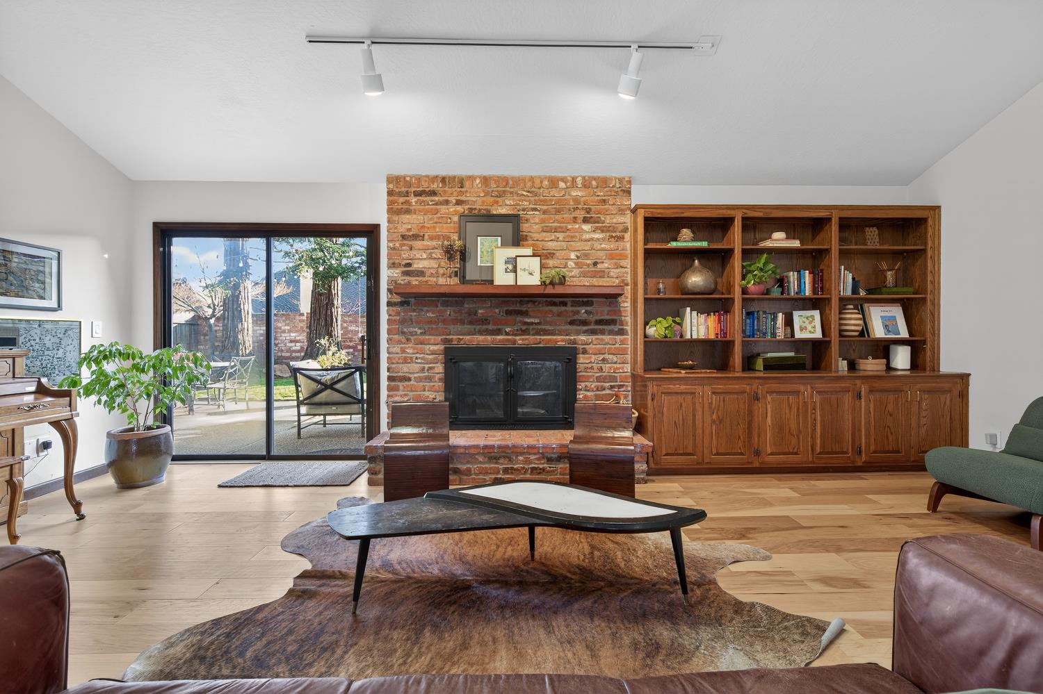2348 Eilers Lane Lodi, CA 95242 - Photo 14 of 46 a living room with furniture and a fireplace