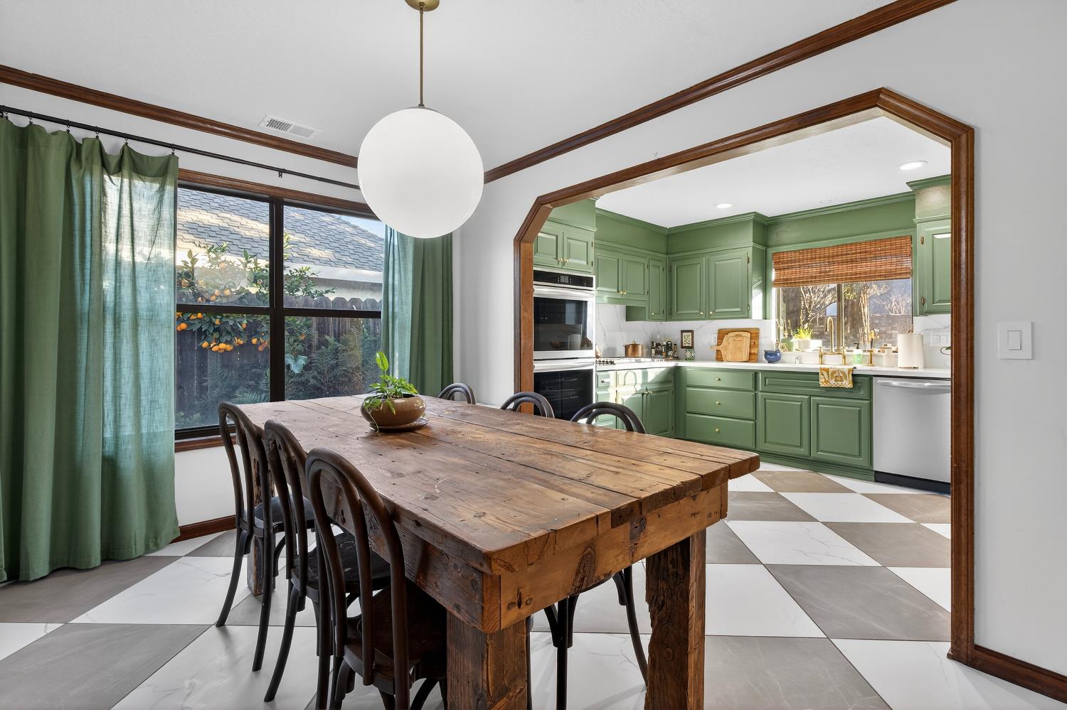 2348 Eilers Lane Lodi, CA 95242 - Photo 15 of 46 a view of a dining room with furniture window and wooden floor