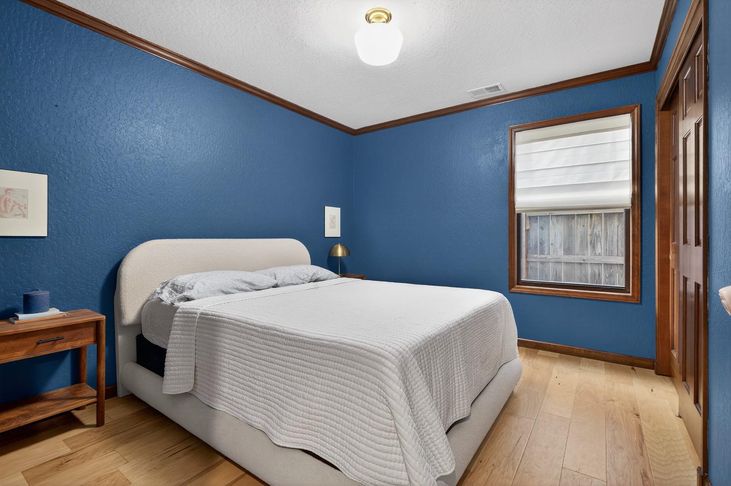 2348 Eilers Lane Lodi, CA 95242 - Photo 30 of 46 a bedroom with a bed and a window