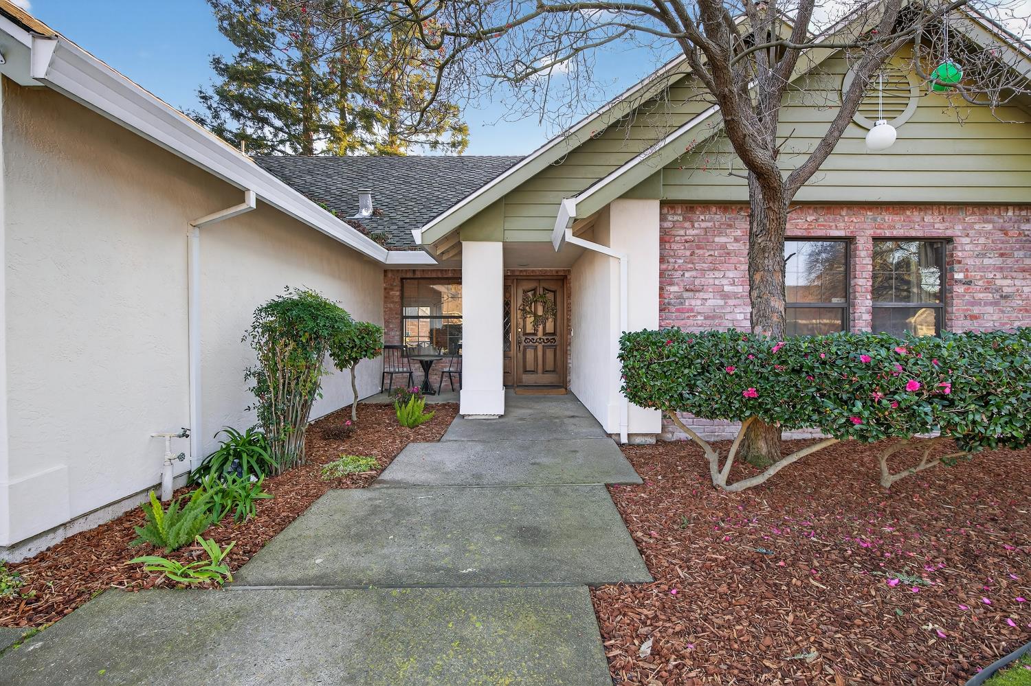 2348 Eilers Lane Lodi, CA 95242 - Photo 4 of 46 a view of a patio with table and chairs and potted plants