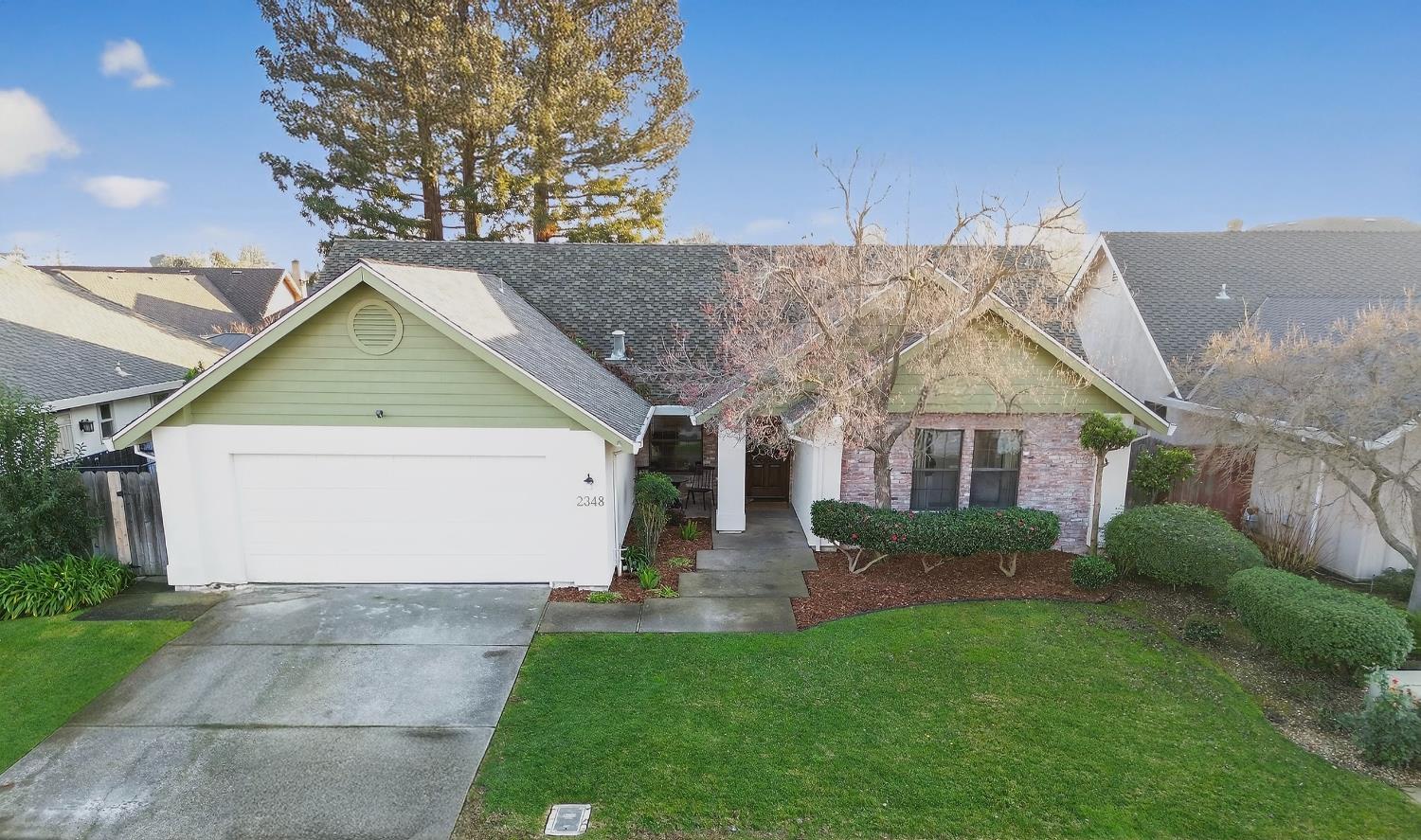 2348 Eilers Lane Lodi, CA 95242 - Photo 45 of 46 a view of house and garden with large trees