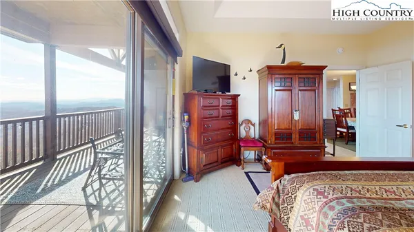 a bedroom with a bed and furniture