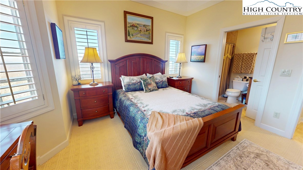 200 Trails End, Unit 36A Sugar Mountain, NC 28604 - Photo 23 of 35 a bedroom with bed and a window