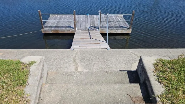a view of outdoor space with deck and kitchen counter