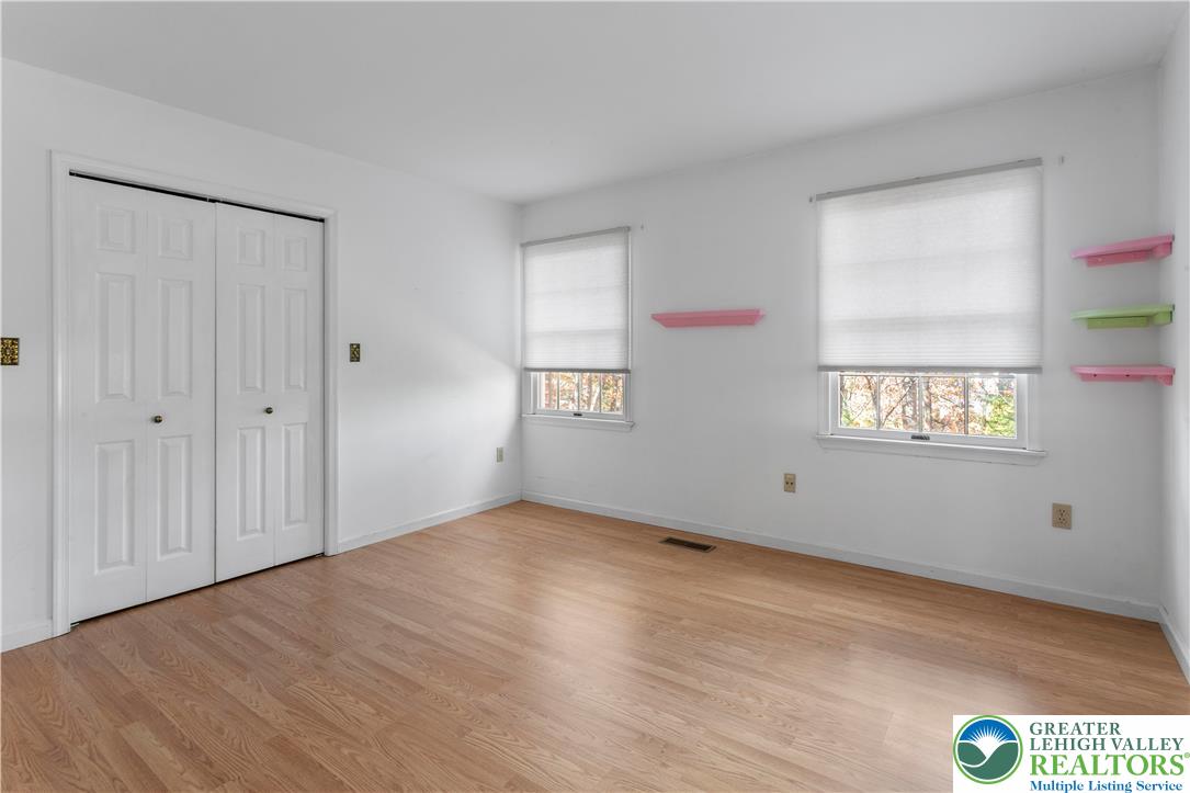 434 Schoeneck Avenue Nazareth, PA 18064 - Photo 16 of 39 a view of an empty room with wooden floor and a window