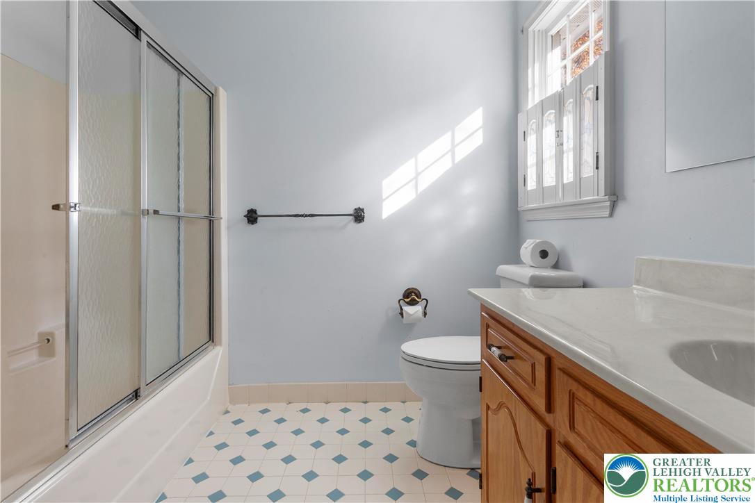 434 Schoeneck Avenue Nazareth, PA 18064 - Photo 25 of 39 a bathroom with a sink a toilet a shower and a mirror