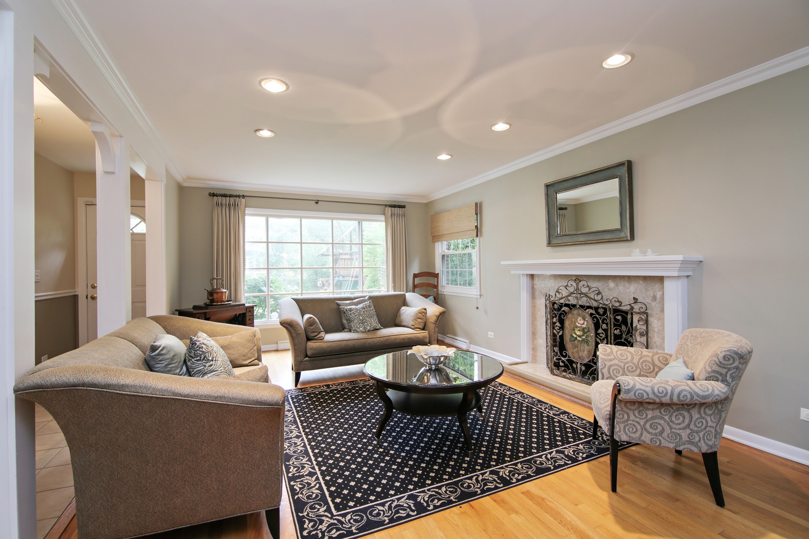 1422 Hackberry Road Deerfield, IL 60015 - Photo 2 of 12 a living room with furniture and a fireplace