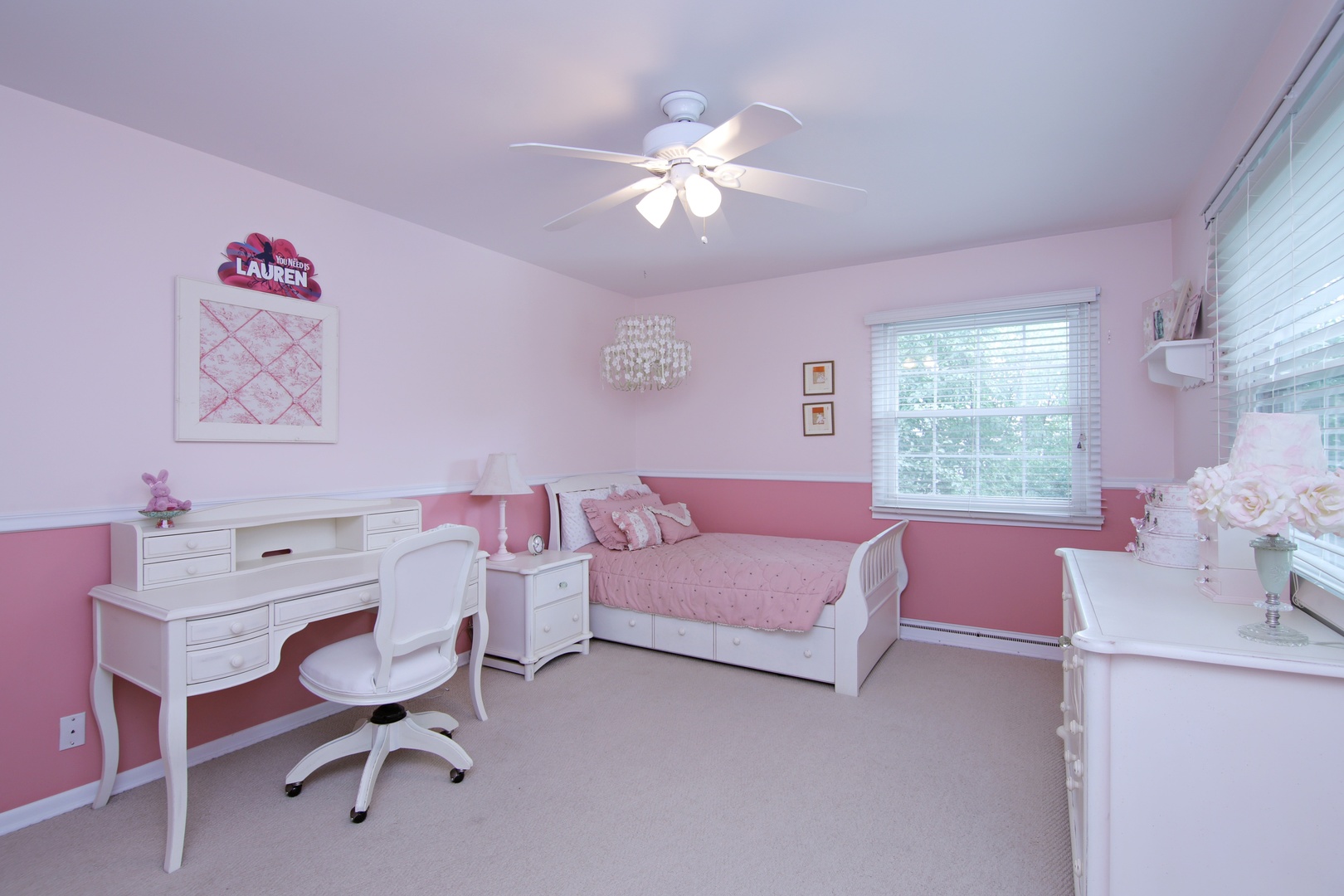 1422 Hackberry Road Deerfield, IL 60015 - Photo 9 of 12 a bedroom with a bed and a chandelier