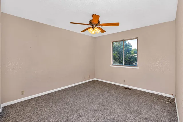 a bathroom with a sink a mirror and a shower