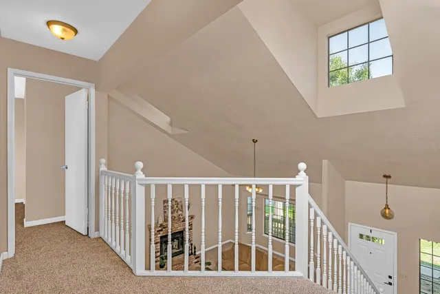 a backyard of a house with large trees