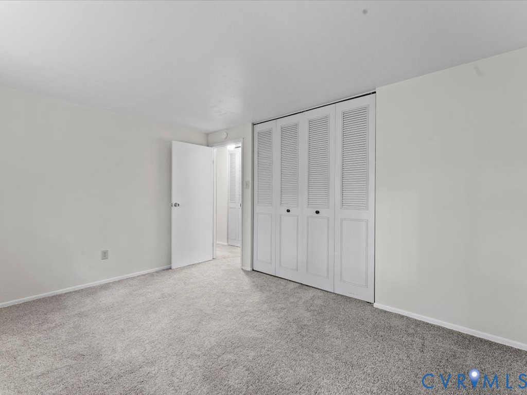 9611 Kennesaw Road Chesterfield, VA 23236 - Photo 20 of 20 Unfurnished bedroom featuring a closet and carpet