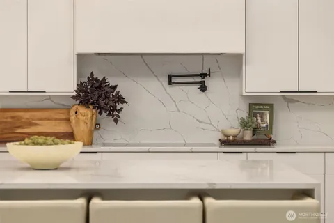 a close view of sink and cabinets