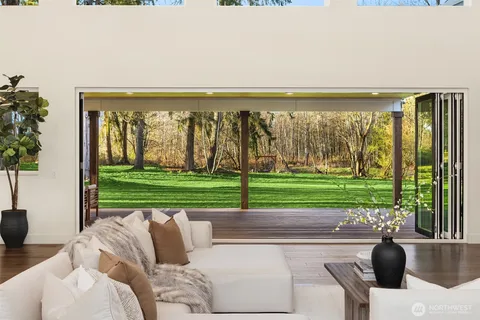 a view of swimming pool and outdoor seating