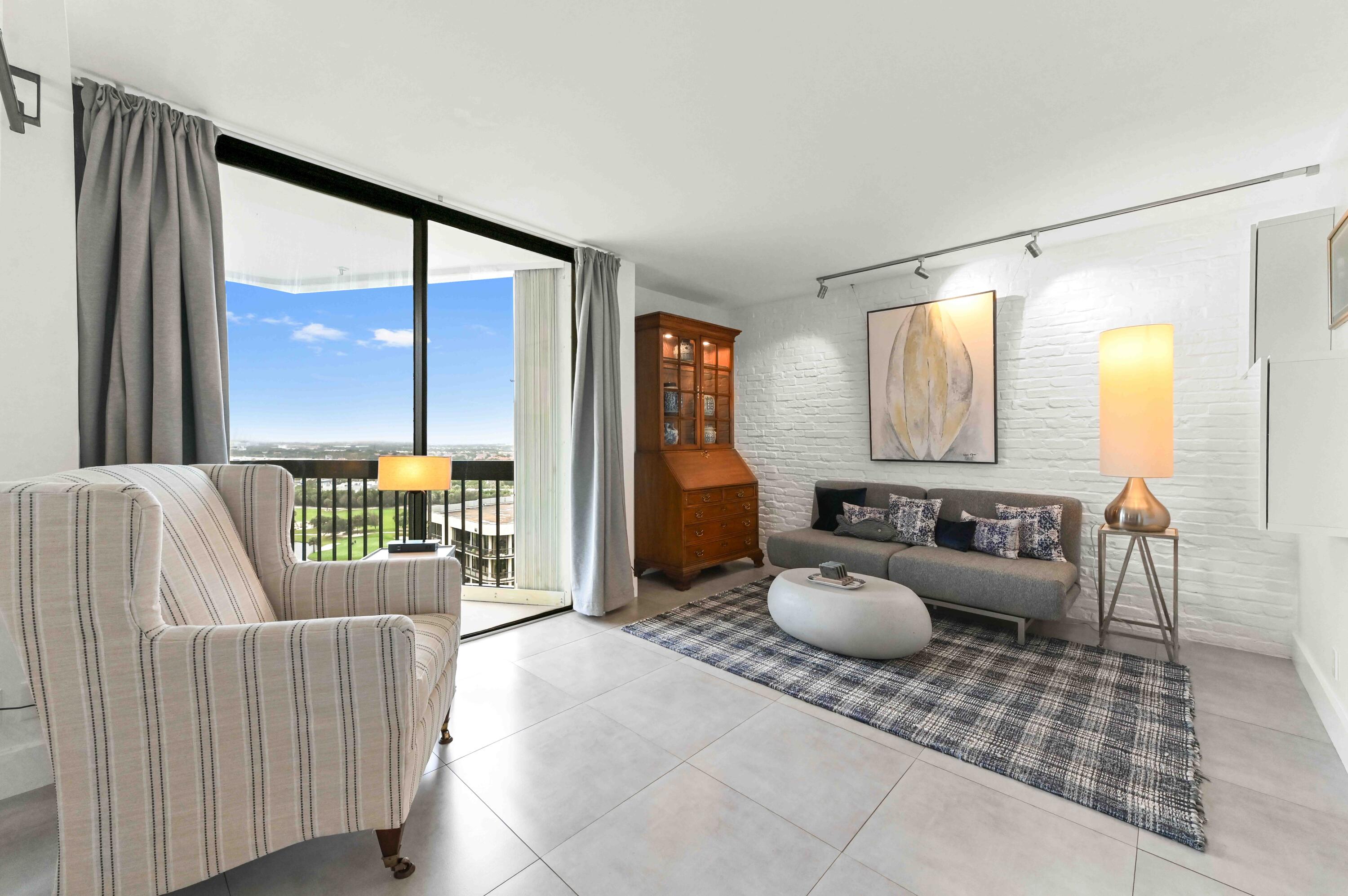 2425 Presidential Way, Unit 1806 West Palm Beach, FL 33401 - Photo 23 of 45 25 family room 01