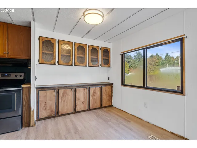a view interior of a house with wooden floor and windows