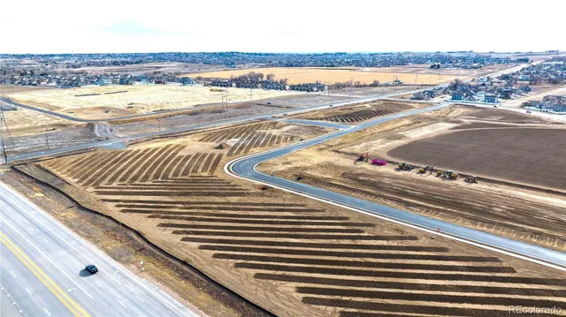 a view of a city with an ocean view