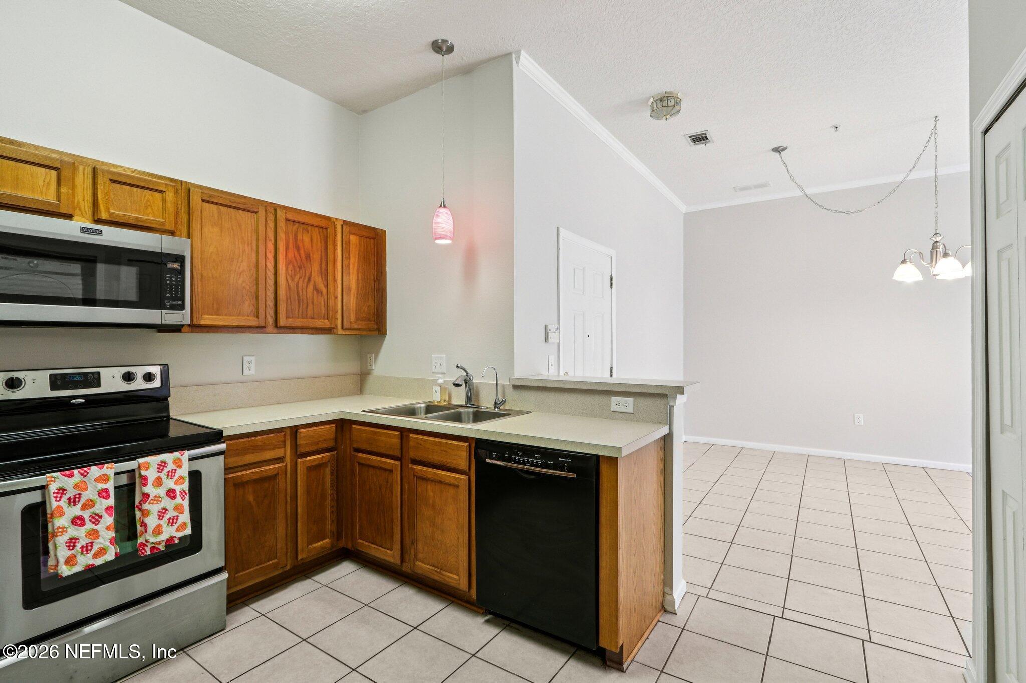 7920 Merrill Road, Unit 408 Jacksonville, FL 32277 - Photo 11 of 30 Kitchen