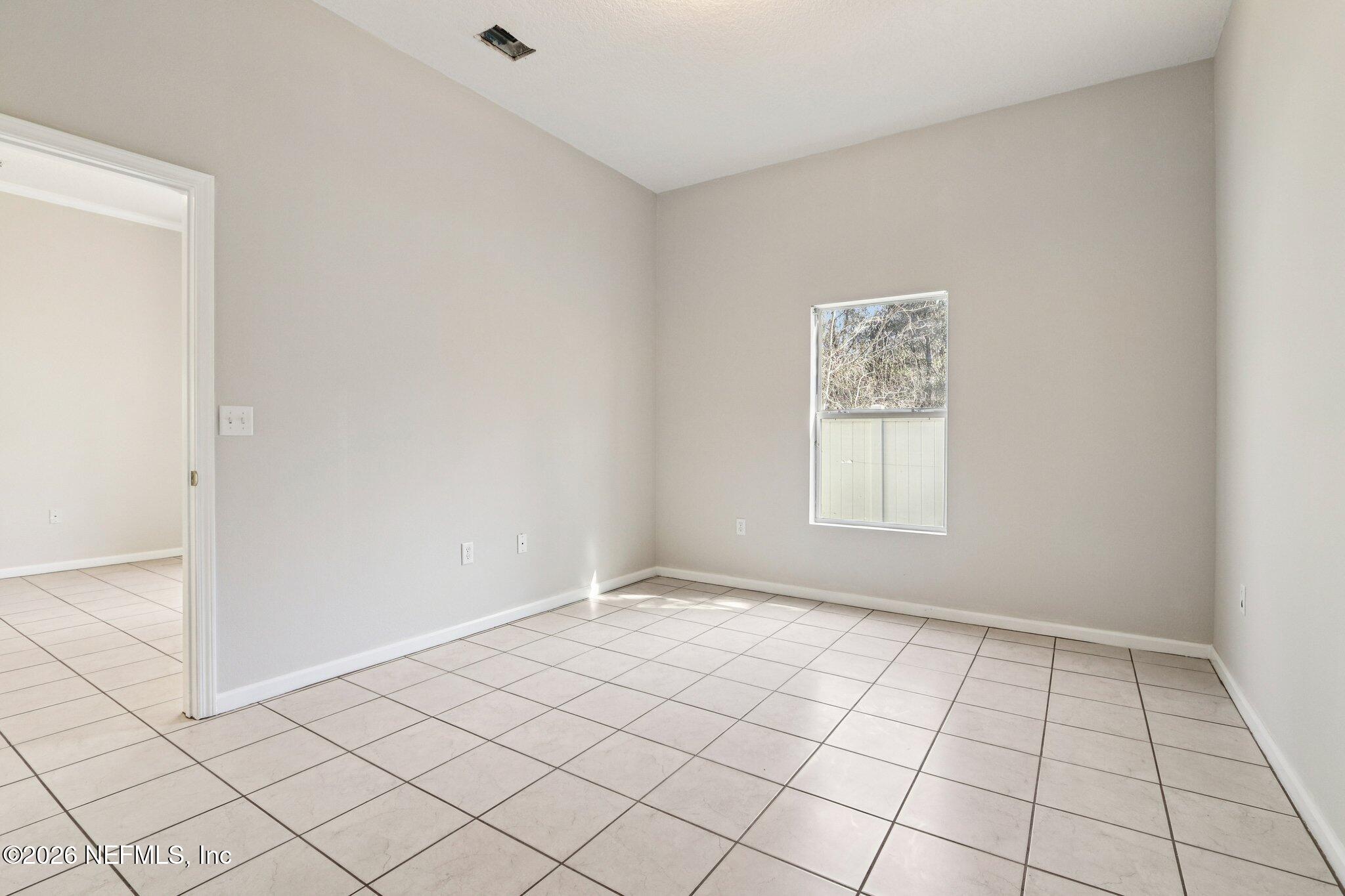 7920 Merrill Road, Unit 408 Jacksonville, FL 32277 - Photo 18 of 30 Master bedroom