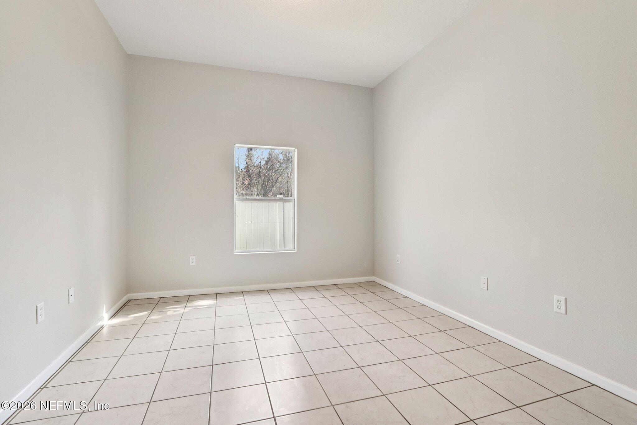 7920 Merrill Road, Unit 408 Jacksonville, FL 32277 - Photo 19 of 30 Master Bedroom