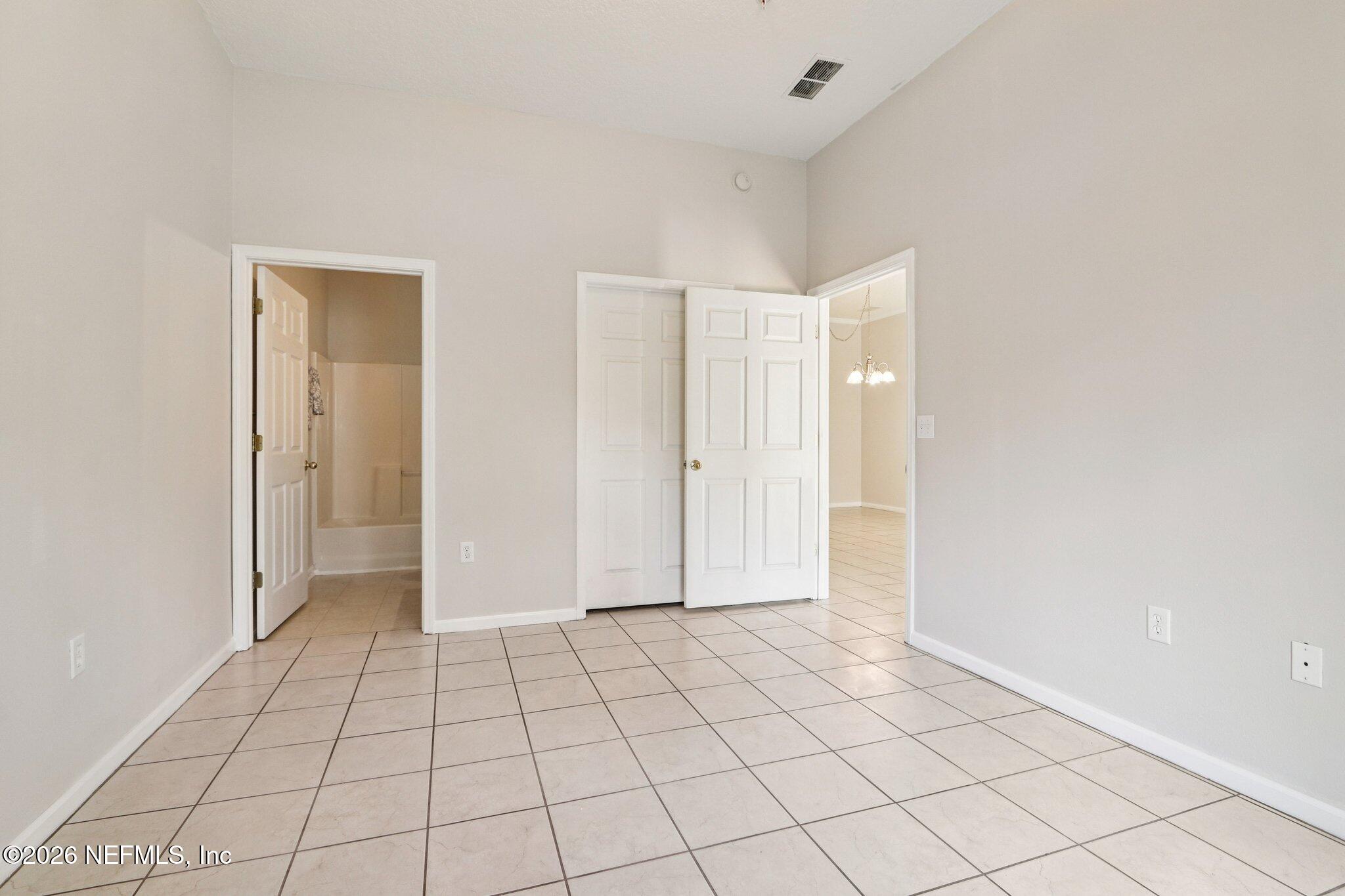 7920 Merrill Road, Unit 408 Jacksonville, FL 32277 - Photo 20 of 30 Master Bedroom
