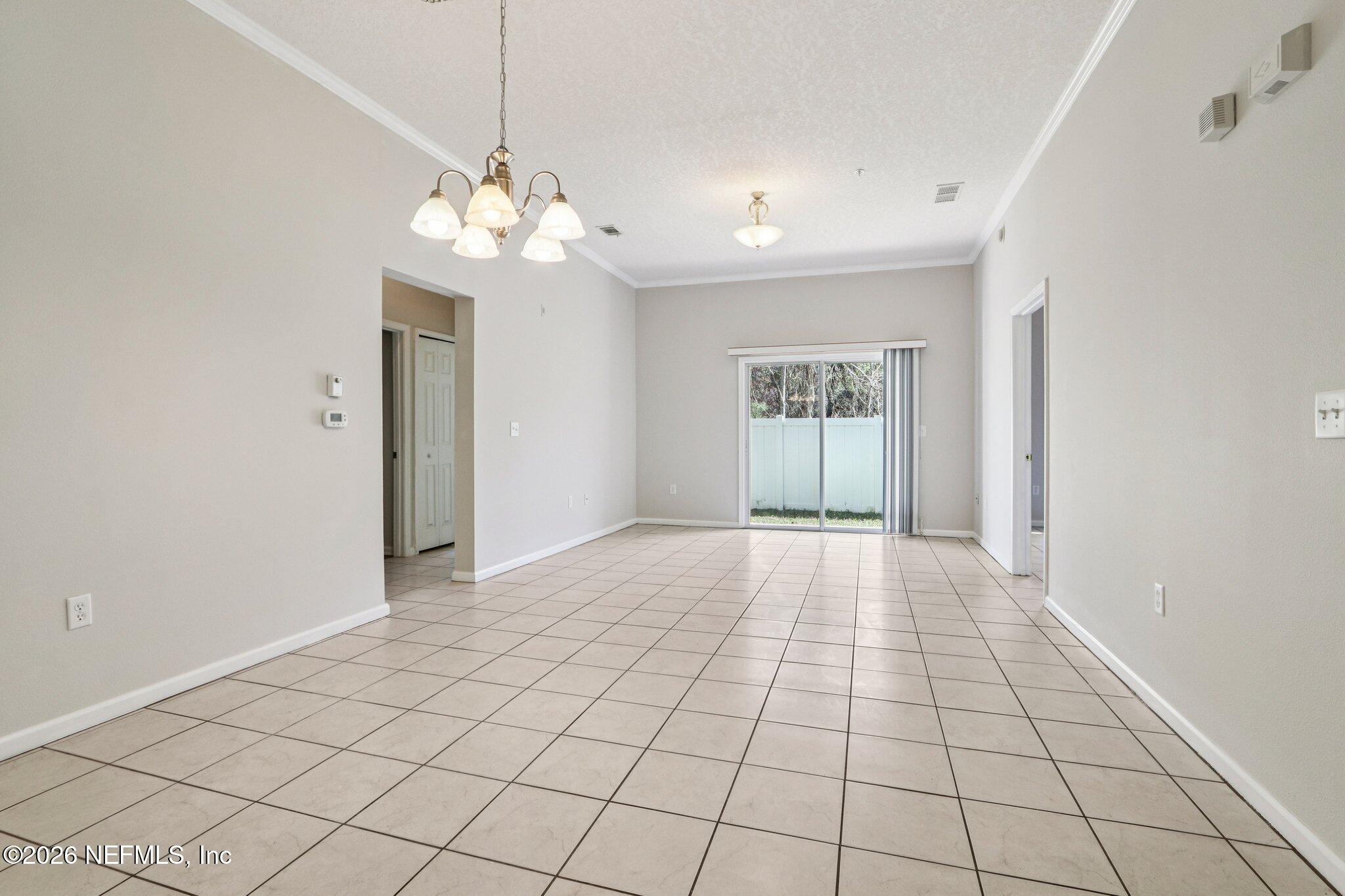 7920 Merrill Road, Unit 408 Jacksonville, FL 32277 - Photo 8 of 30 Living/Dining Room