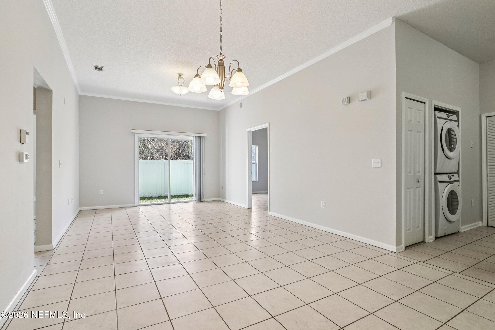 7920 Merrill Road, Unit 408 Jacksonville, FL 32277 - Photo 9 of 30 Living / Dining Room