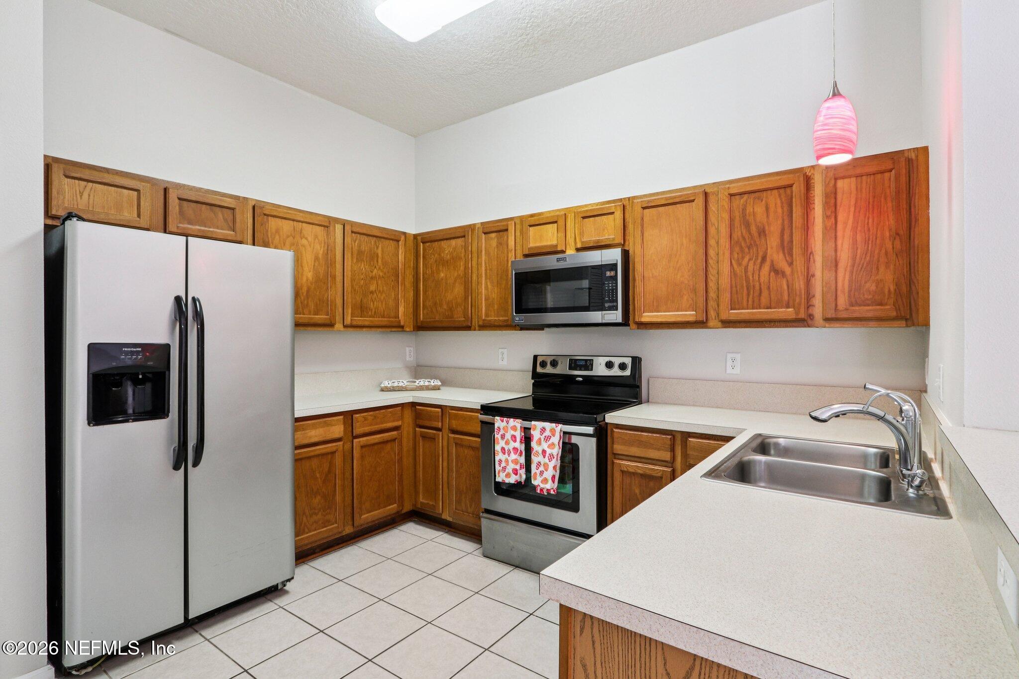 7920 Merrill Road, Unit 408 Jacksonville, FL 32277 - Photo 10 of 30 Kitchen