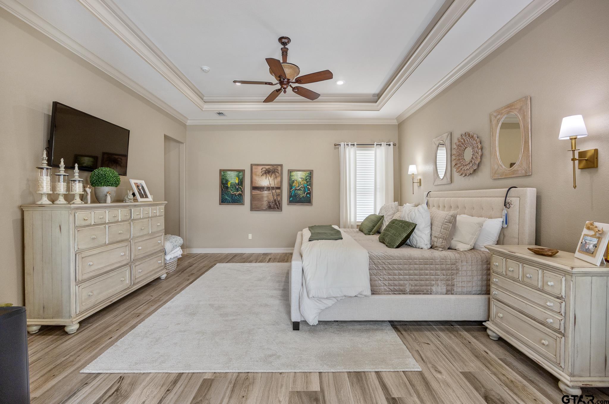 5875 Stonegate Trail Tyler, TX 75703 - Photo 15 of 47 a living room with furniture and a dresser