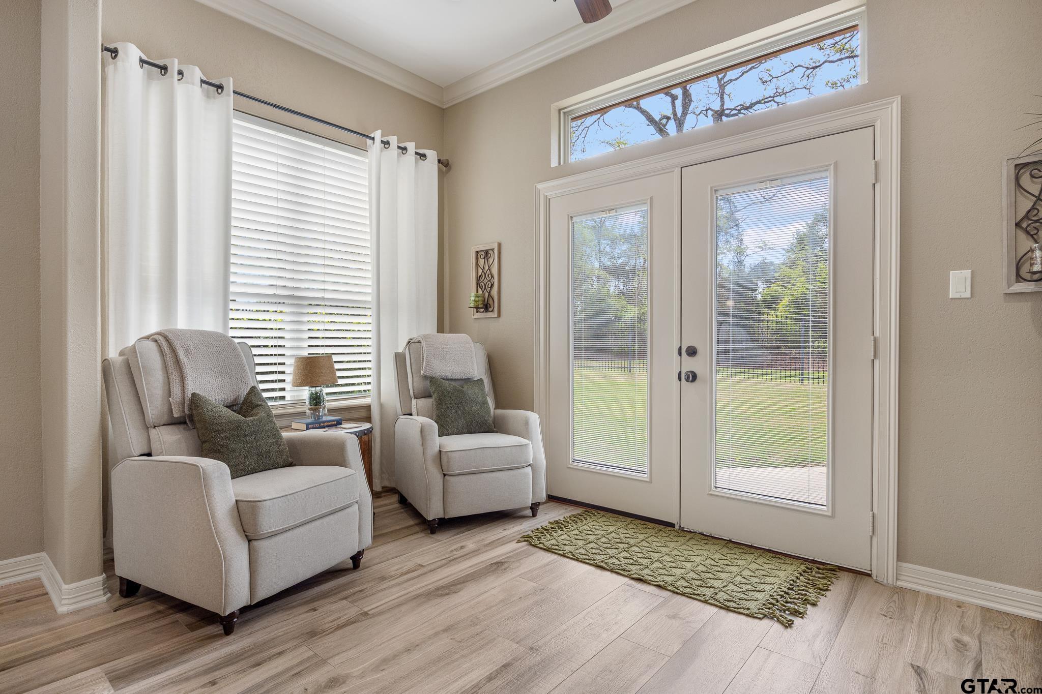 5875 Stonegate Trail Tyler, TX 75703 - Photo 16 of 47 a living room with furniture and a window
