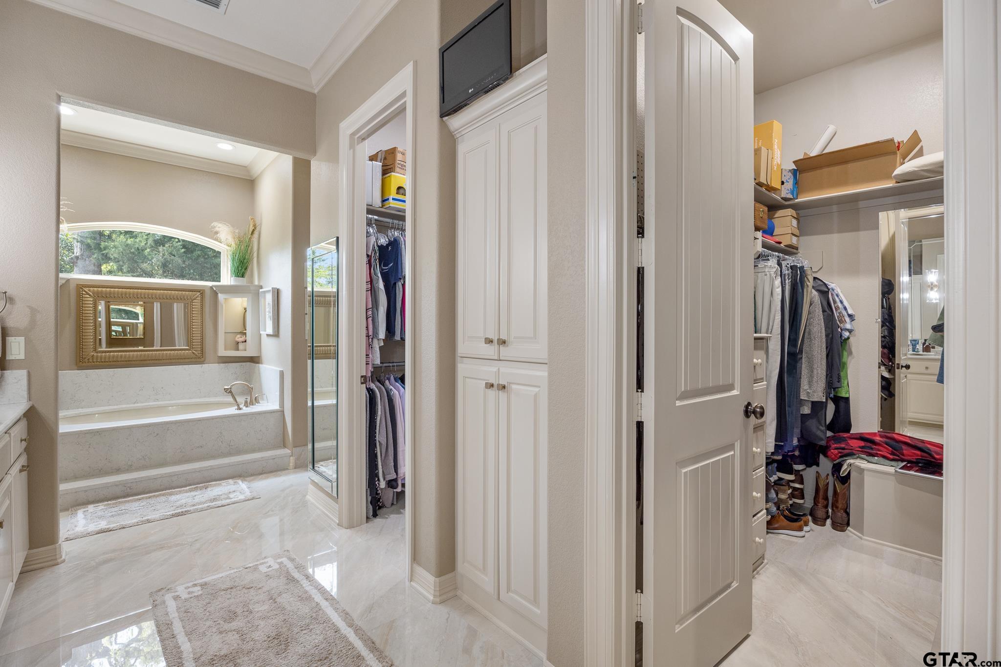 5875 Stonegate Trail Tyler, TX 75703 - Photo 18 of 47 a view of a livingroom with wooden floor and a bathroom