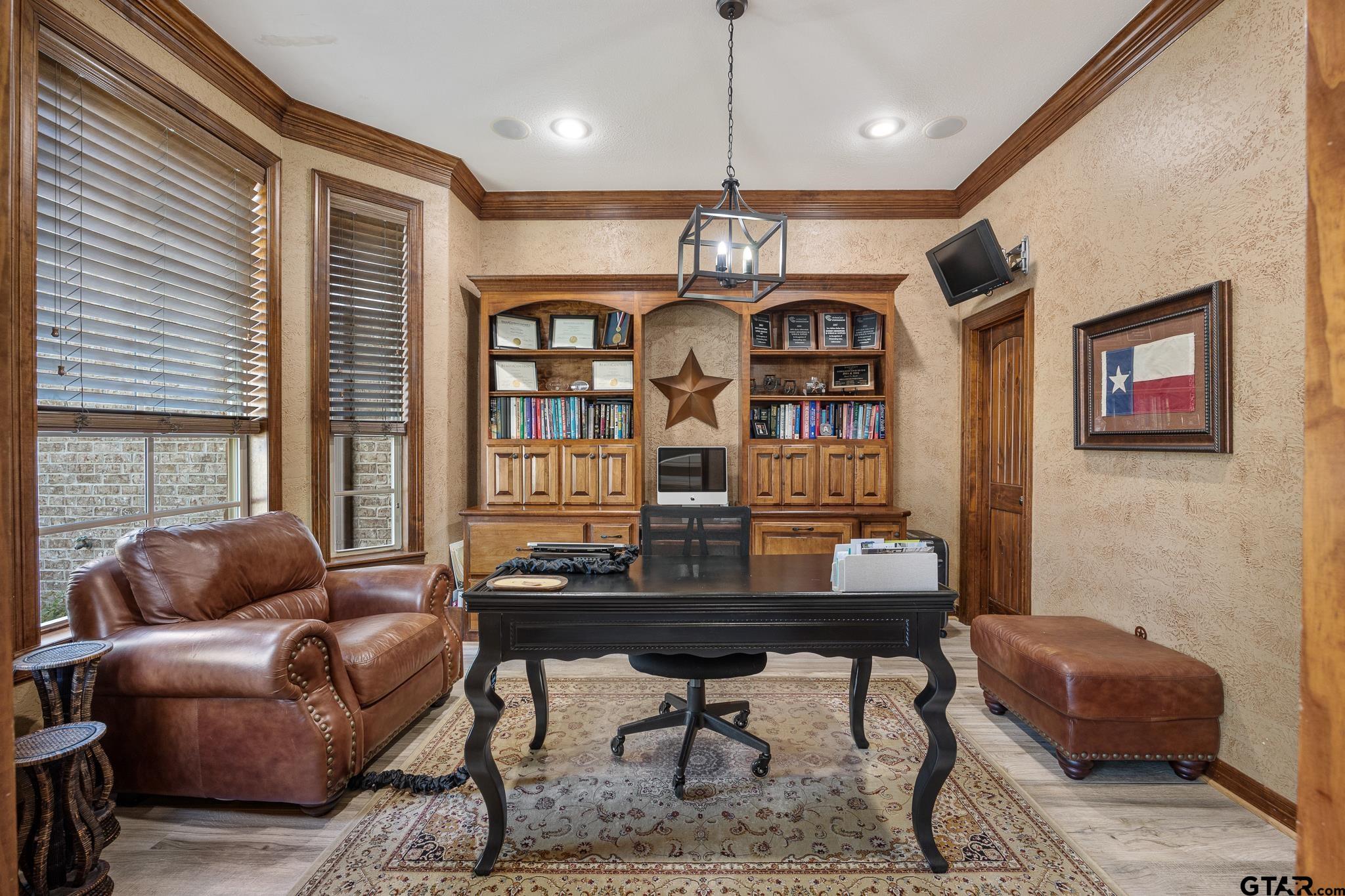 5875 Stonegate Trail Tyler, TX 75703 - Photo 20 of 47 a living room with furniture a window and a chandelier