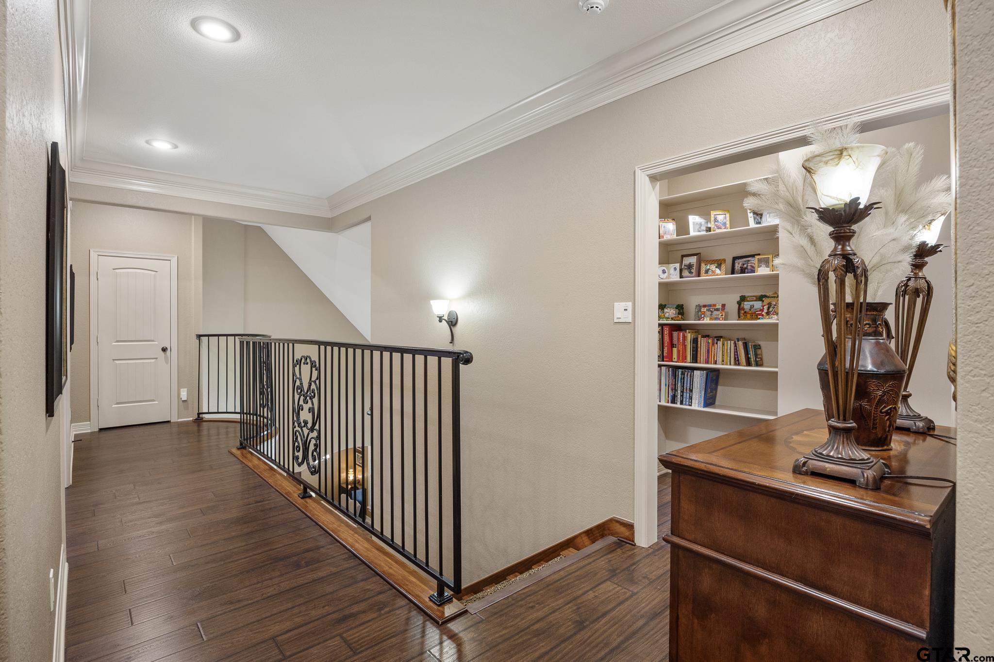 5875 Stonegate Trail Tyler, TX 75703 - Photo 22 of 47 a view of a hallway with workspace