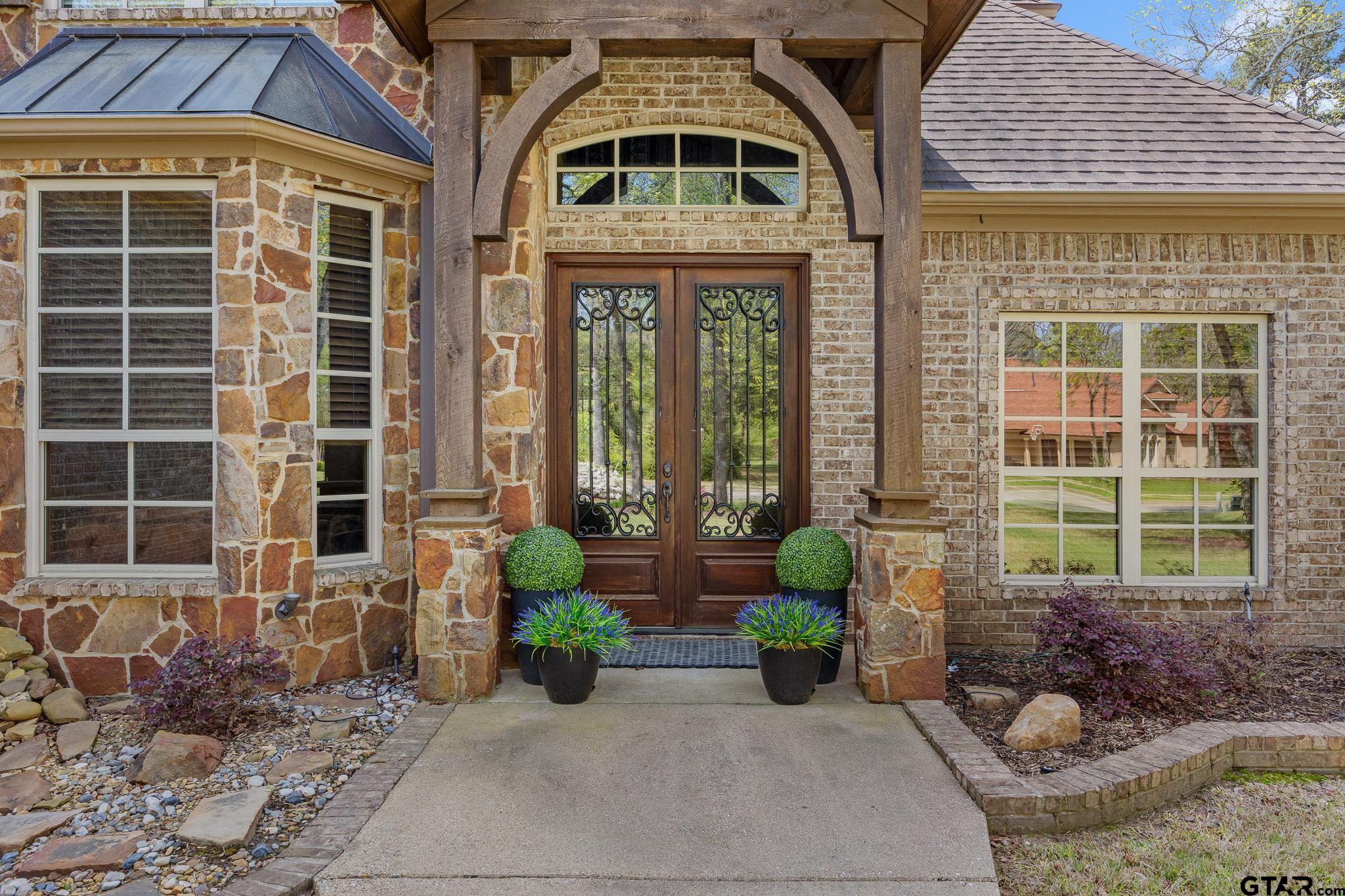 5875 Stonegate Trail Tyler, TX 75703 - Photo 4 of 47 a front view of a house