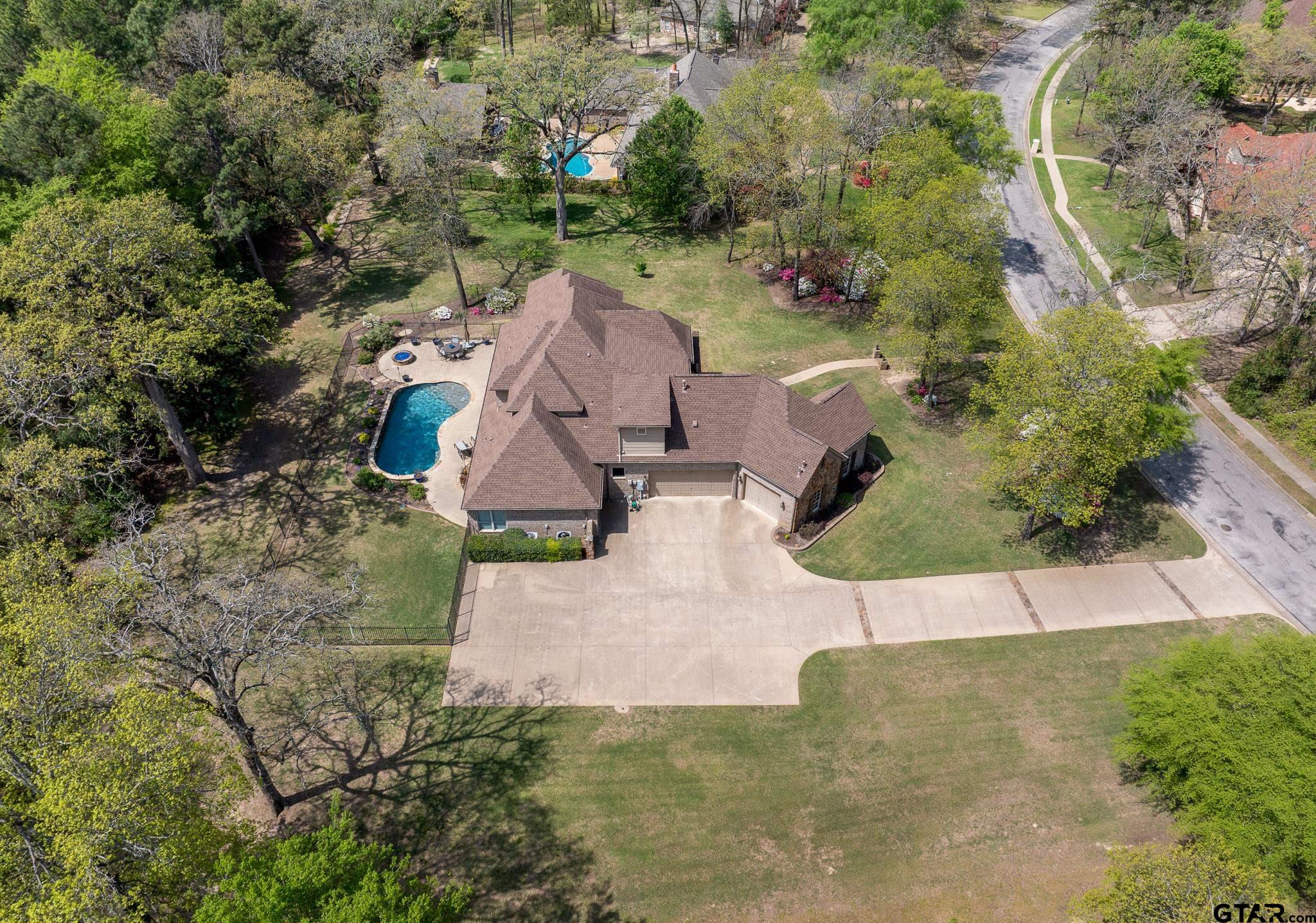 5875 Stonegate Trail Tyler, TX 75703 - Photo 42 of 47 an aerial view of a house with outdoor space