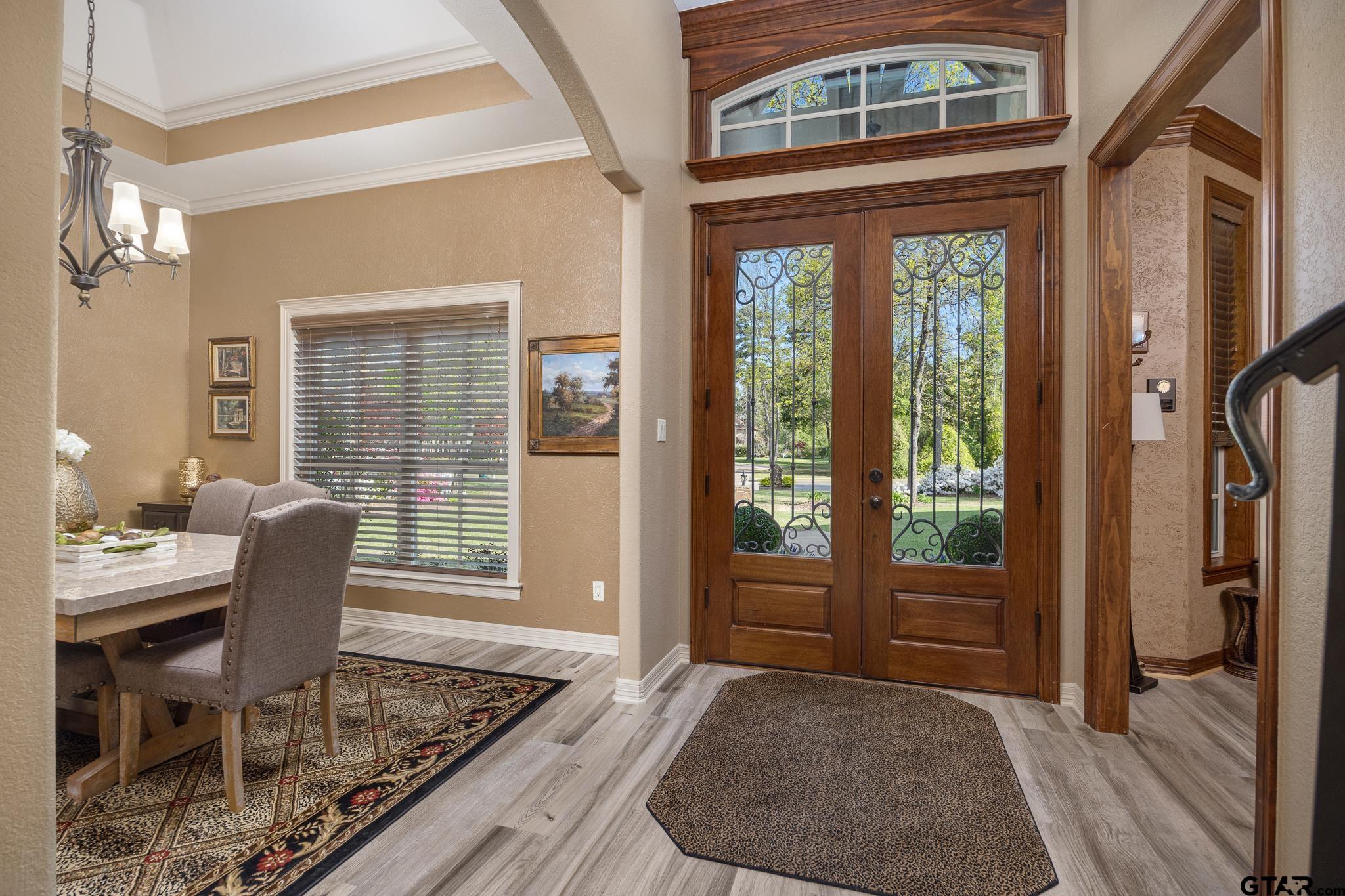 5875 Stonegate Trail Tyler, TX 75703 - Photo 5 of 47 a living room with furniture and a window