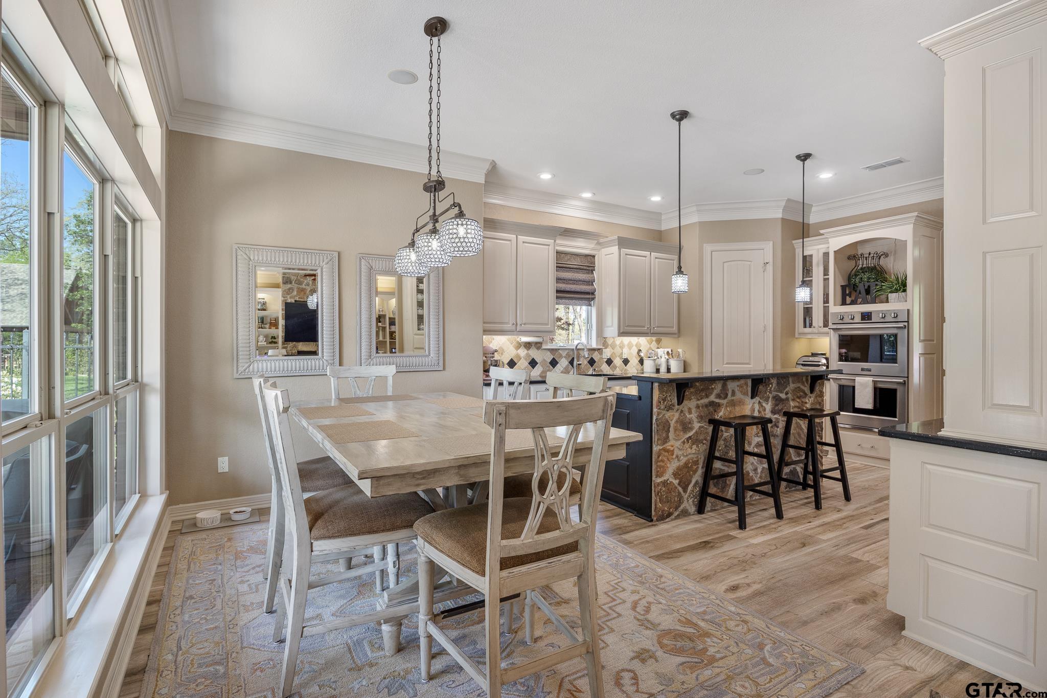 5875 Stonegate Trail Tyler, TX 75703 - Photo 7 of 47 a view of a dining room with furniture