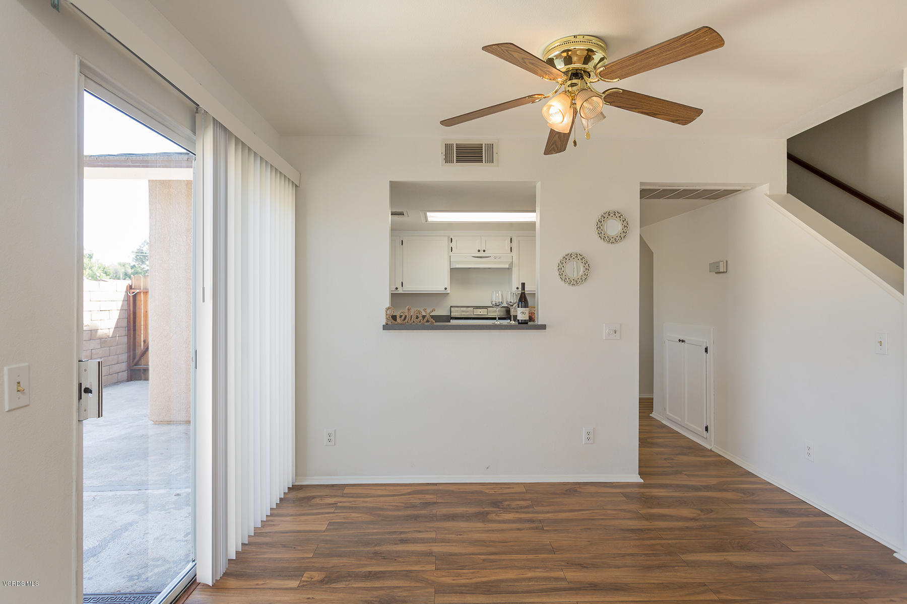 4516 Apricot Road, Unit B Simi Valley, CA 93063 - Photo 14 of 24 a view of empty room with wooden floor and fan