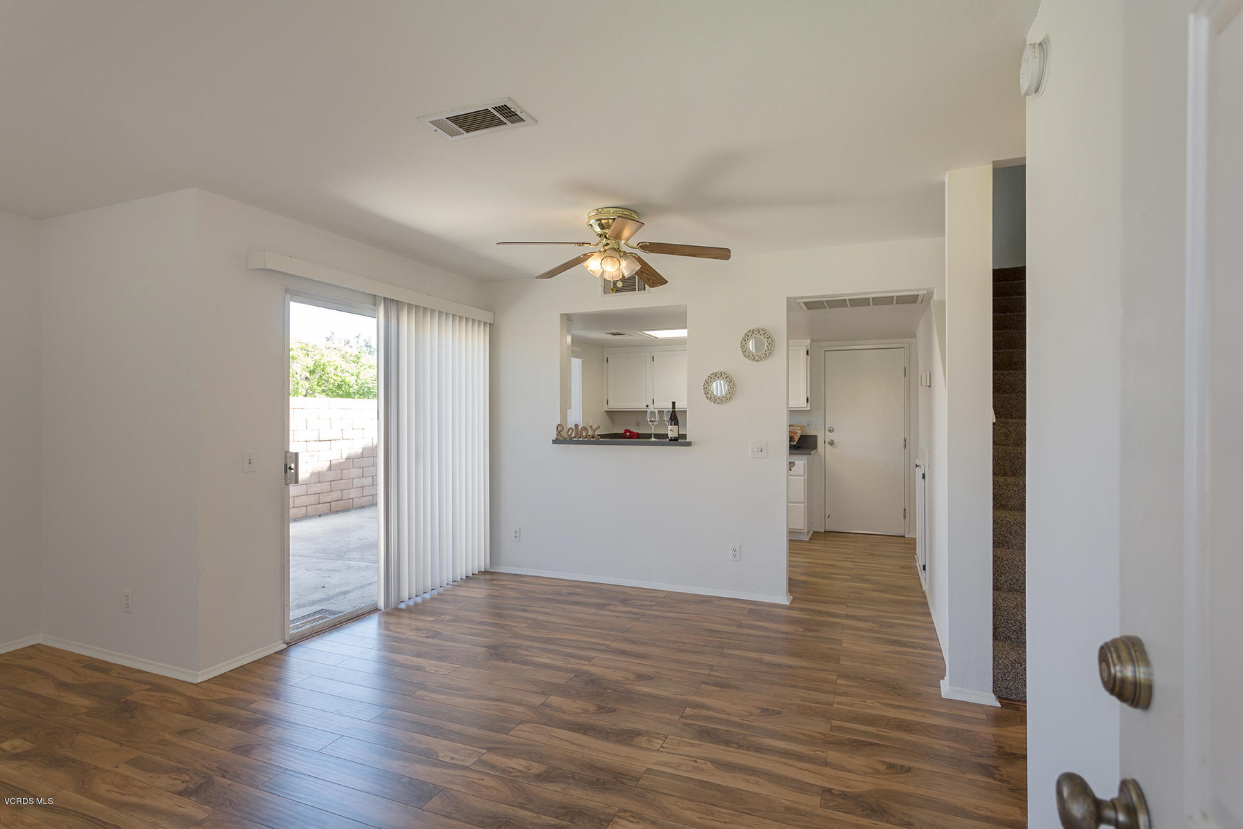 4516 Apricot Road, Unit B Simi Valley, CA 93063 - Photo 9 of 24 wooden floor in an empty room with a window