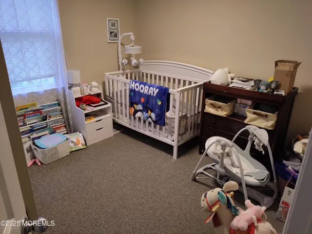 a view of workspace with wooden floor windows
