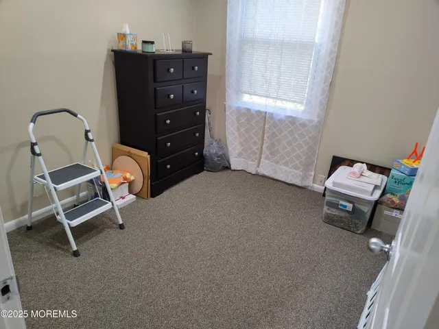 a view of workspace with lounge chair