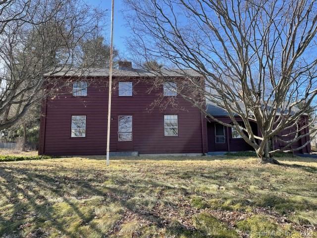 131 Maple Street Wethersfield, CT 06109 - Photo 1 of 1 a brick house with tree in front of it