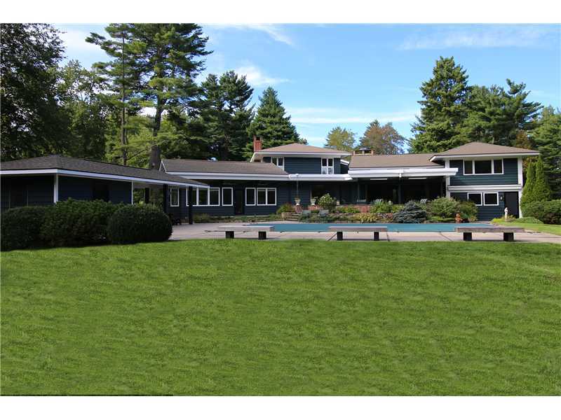 50 Hanson Road Darien, CT 06820 - Photo 1 of 21 a view of a big yard next to a building